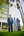 Silvano Cardenas, Jr. and his parents outside Sierra Towers men's dorm where Silvano, Jr. landed his first job as a college freshman four years ago. He now works as a campus admissions counselor.