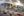 The photographic Creation Wall stands opposite a large mural painting inside of a glass-walled meeting room depicting Jesus and the last supper.