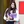 A female Spanish student standing with her folder and smiling