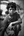 A Gypsy boy on the Island of Patmos, a Greek Island in the Aegean Sea pauses for a photograph in a black and white by Peter Erhard whose work is drawn from the lives of people in various countries.