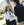 La Sierra University students talking together on Founders Green, the large lawn area on campus