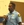 Former San Francisco 49ers football player Kermit Alexander talks to young people attending La Sierra University's first basketball camp.