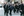 Adjunct music professor and six-time Emmy-winning composer Gary Kuo, left, walks with Elvin Rodriguez and the Wind Ensemble to Carnegie Hall. The ensemble premiered Kuo's work, “Fighters of Fate” at Carnegie.