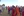 Dennis Hansberger walks with tribesmen in Kenya.