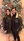 Silvana Abornoz, director of The Wash Project at La Sierra University and biochemistry/pre-dentistry major Christian Figueroa pose for a holiday photograph. (courtesy of Christian Figueroa)
