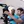 Two male film students operating a camera.