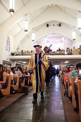 Dr. Robert Thomas, Health and Exercise Science chair, leads the academic processional as convocation begins on Sept. 30. (Photos by Natan Vigna) 