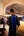John Thomas, dean of the Zapara School of Business gives a thumbs up as he processes to his seat at the beginning of the inauguration ceremony.
