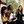 A group of female religious studies students in class talking an laughing.
