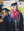 Chris Bauman, a magna cum laude graduate with duo degrees in marketing and management waits in line to march to Founders' Green.