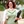 A female Human Resources MBA student walking to class.